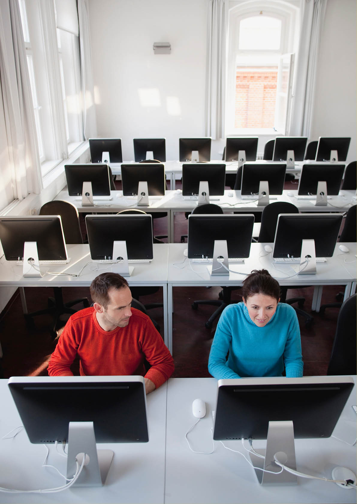 couple sitting together in lecture hall
