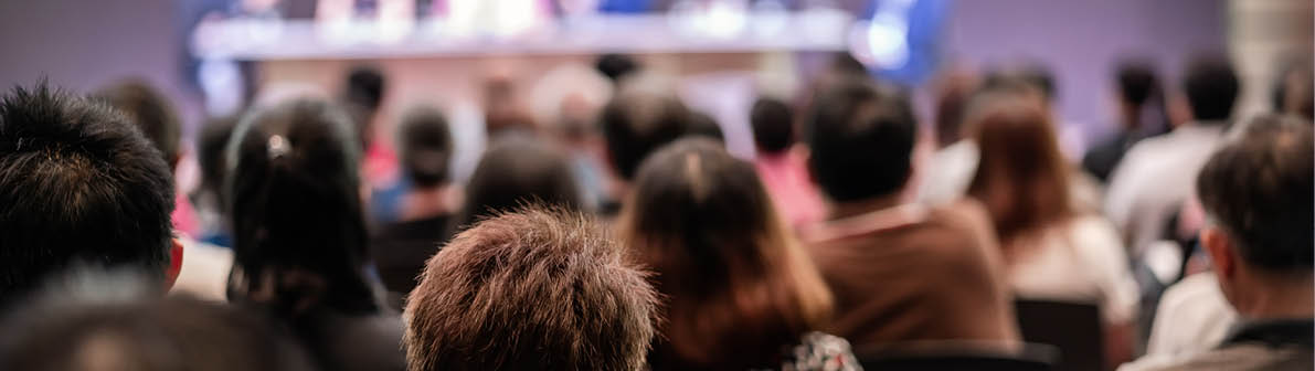 Rear view of Audience in the conference hall or seminar meeting which have Speakers are Brainstorming