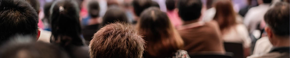 Rear view of Audience in the conference hall or seminar meeting which have Speakers are Brainstorming