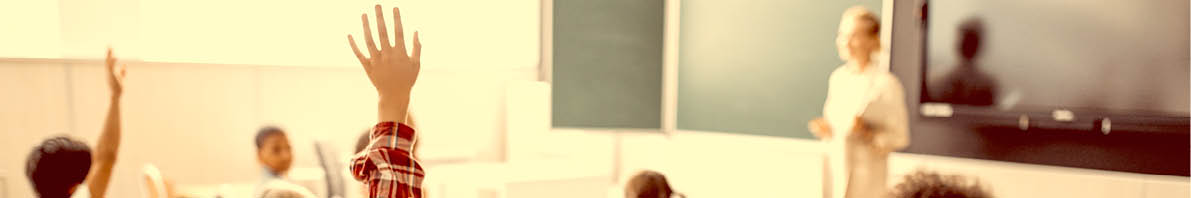 Back to school. Multiracial pupils of primary school are ready to study. Children in class room with teacher