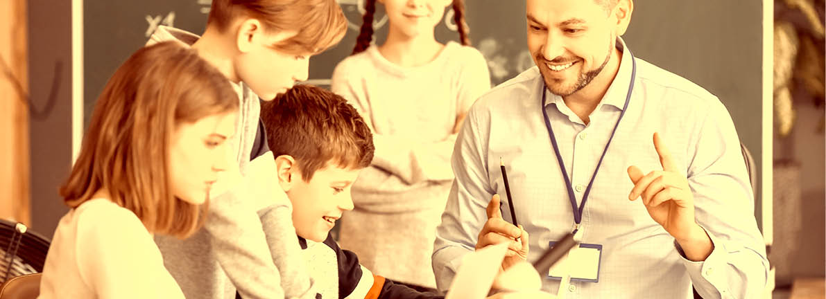 Teacher conducting physics lesson in classroom