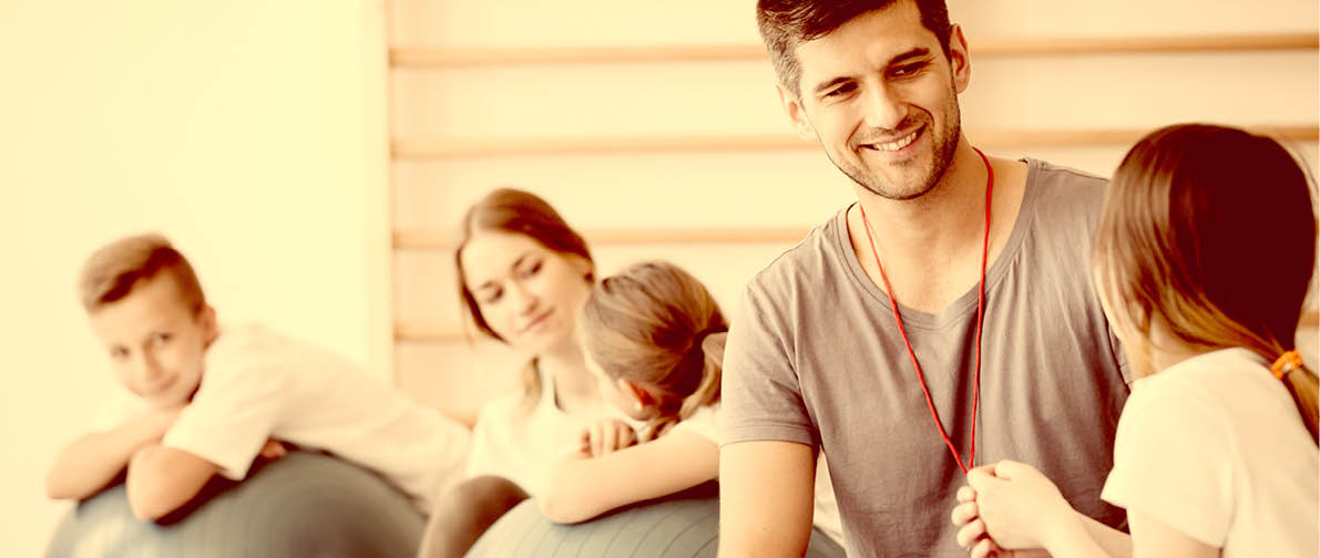 Trainers watching over the kids during physical education classes
