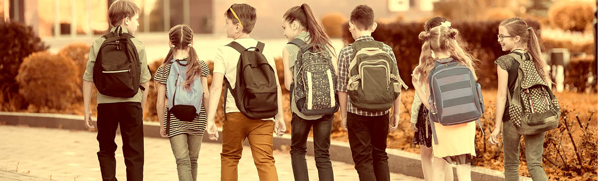 Group of kids going to school together